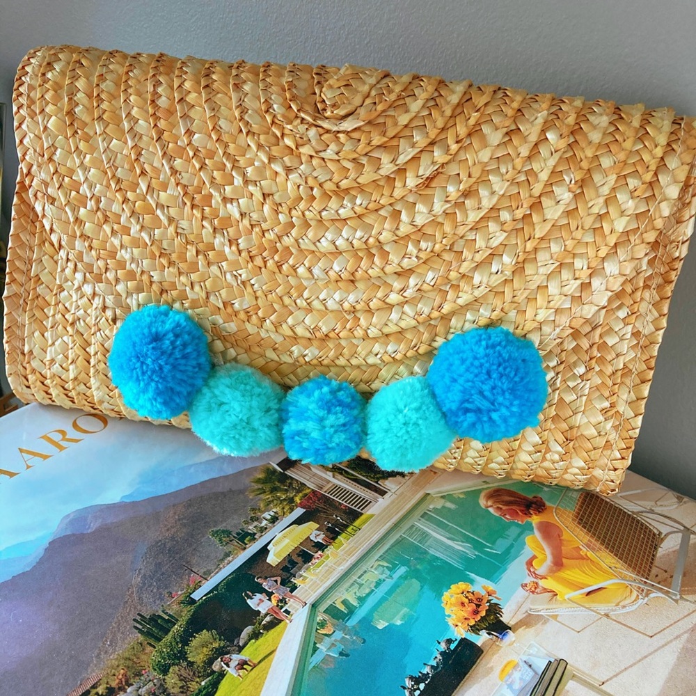 Handmade boho summer clutch with pom poms